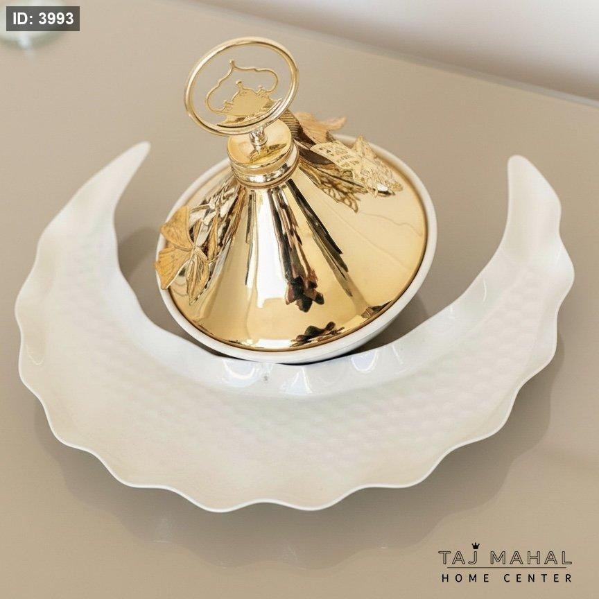 Crescent shaped hostess with gold metal cap