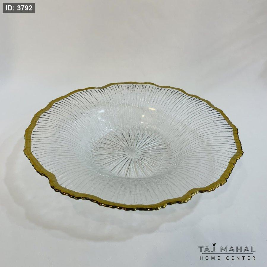 Glass fruit plates with a wavy design and a gold rim