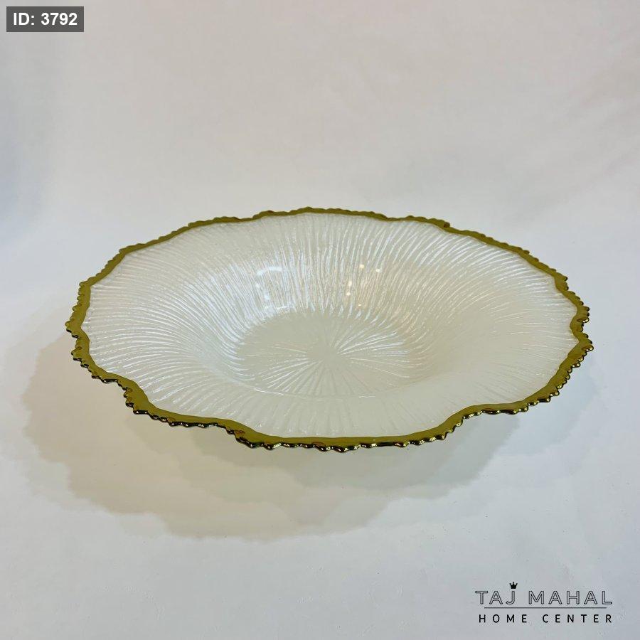 Glass fruit plates with a wavy design and a gold rim