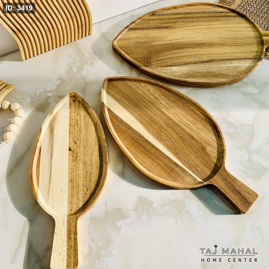 Wooden trays shaped like leaves