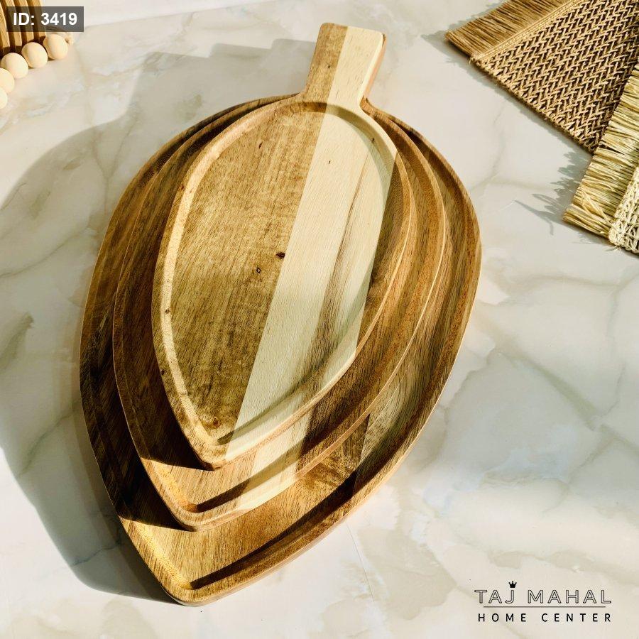 Wooden trays shaped like leaves
