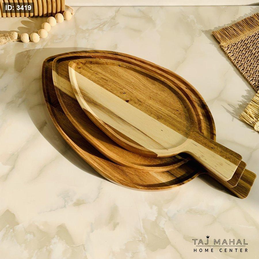 Wooden trays shaped like leaves