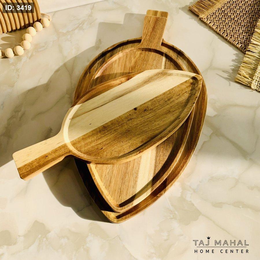 Wooden trays shaped like leaves