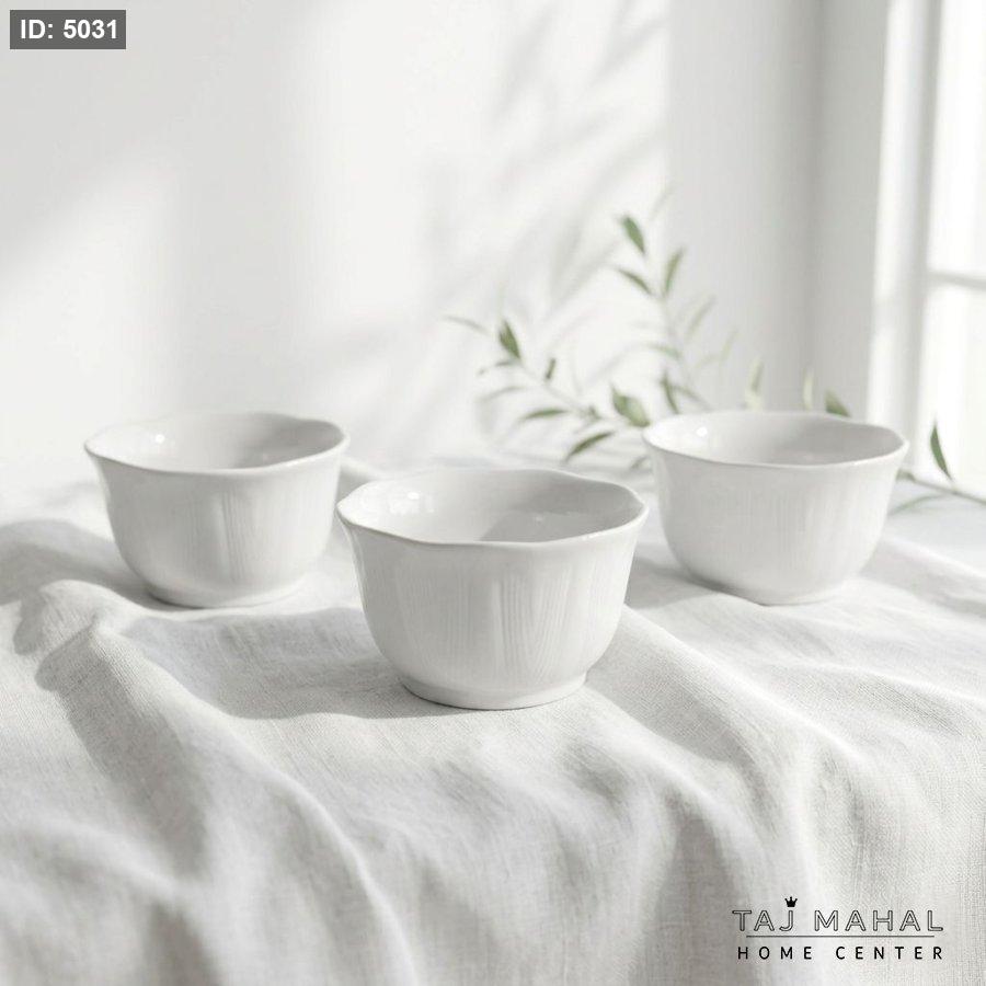 A set of porcelain yogurt plates with wavy edges, 3 pieces