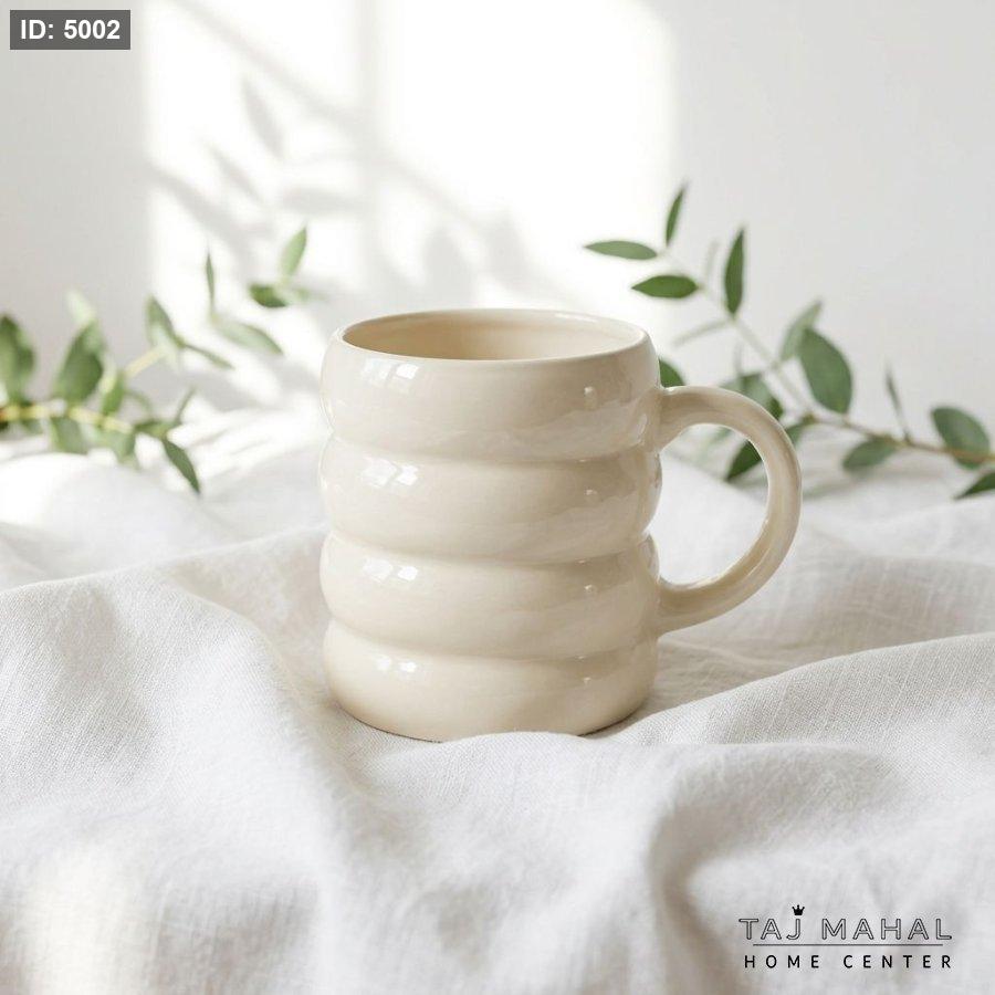 Porcelain mug with spiral design