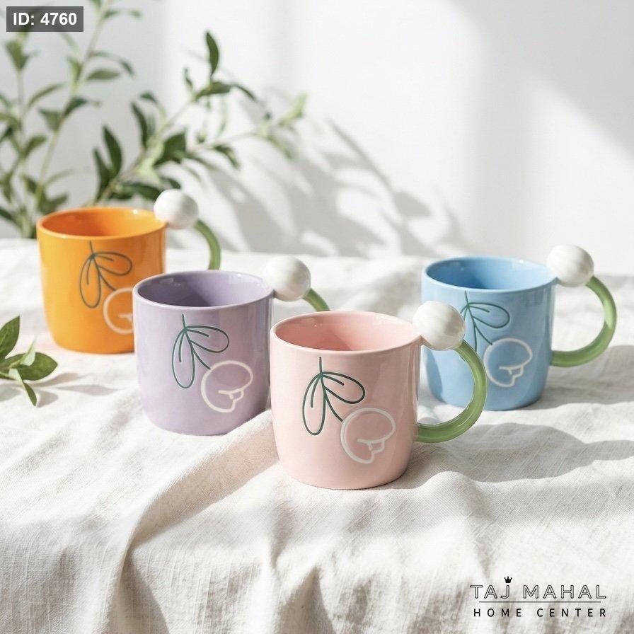 Porcelain mug with tulip flower patterns with a distinctive handle